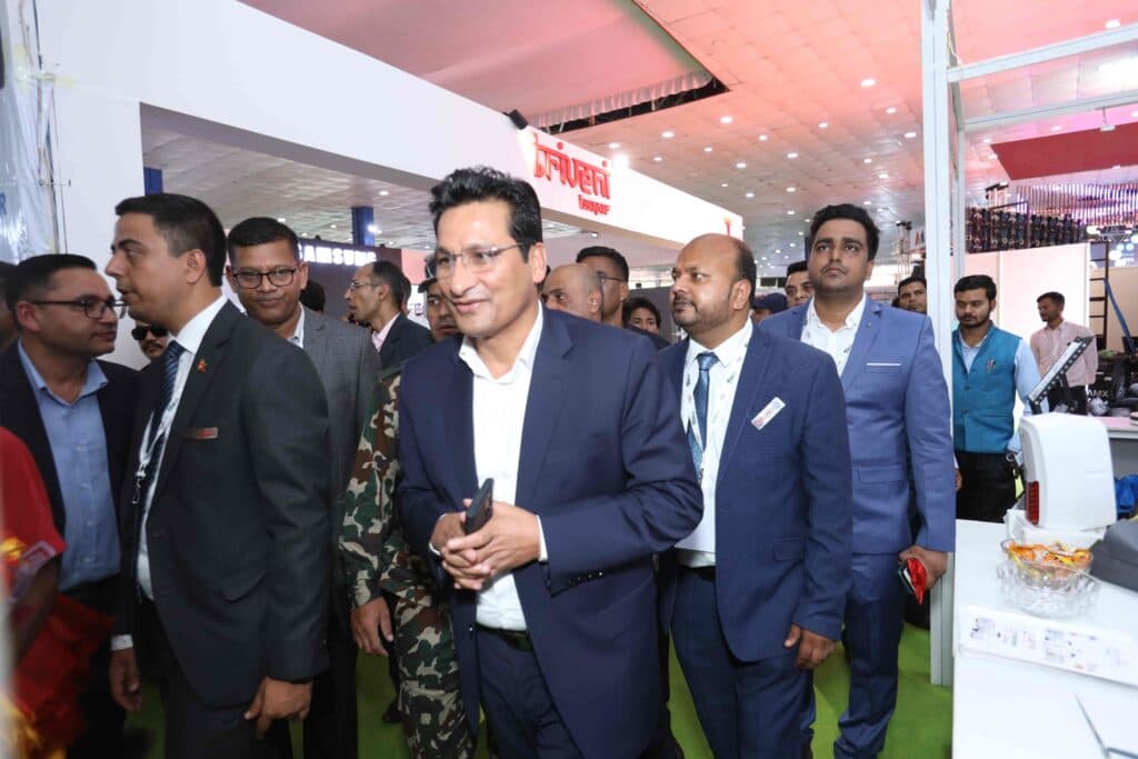 Collage of photographs of exhibitor stands and visitors at the 2025 edition of the Nepal Electric, Power and Lights Expo