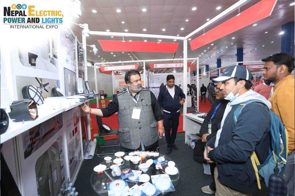 Collage of photographs of the exhibition floor and business meetings at the 2025 edition of the Nepal Electric, Power and Lights Expo